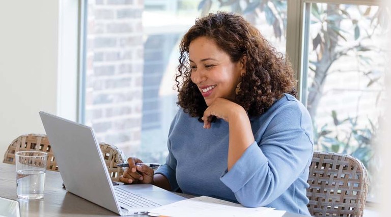 Person using computer at home